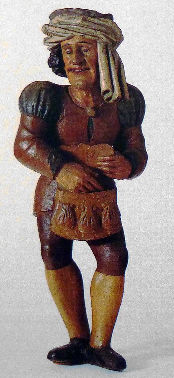 Abgaben zahlender Bauer. Holzfigur, 1534. Rathaus Überlingen.